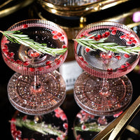 Art Deco Blush Pink Coupe Glasses with Gold Rims Gift Set of 4 – lifestyle hosting shot