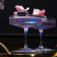 Art Deco Iridescent Champagne and Cocktail Coupe Glasses Gift Set of 4 – styled flat lay for celebrations