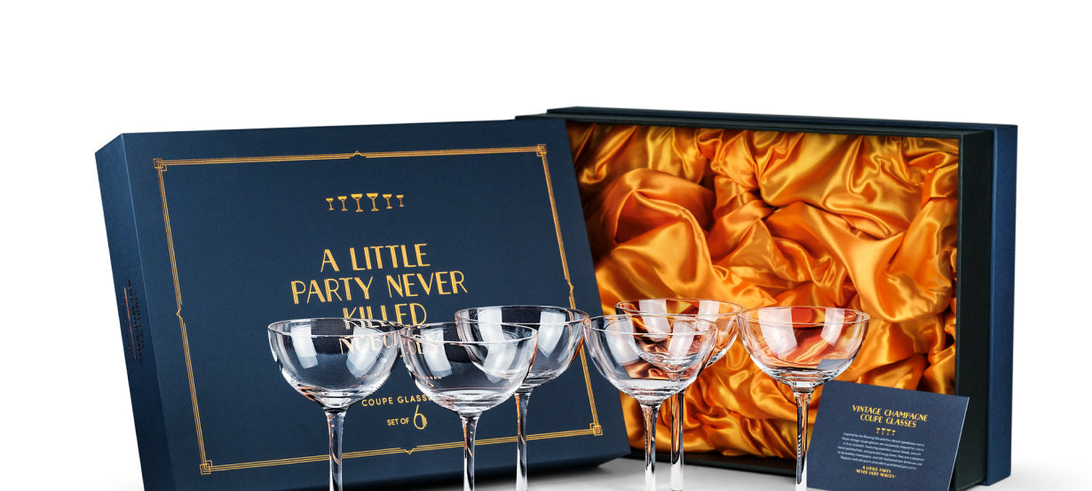 Vintage Roaring 20s champagne coupe glasses in a gift box for an Art Deco wedding
