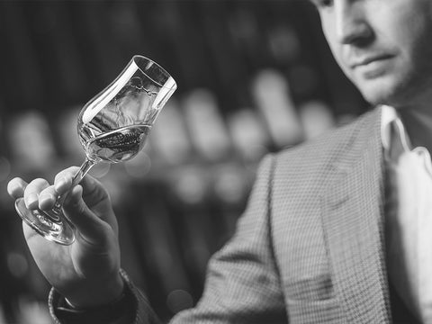 Whiskey tasting glasses lined up for a nosing session